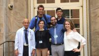 Dr. Lefkowitch with students and staff outside of the P&S building.
